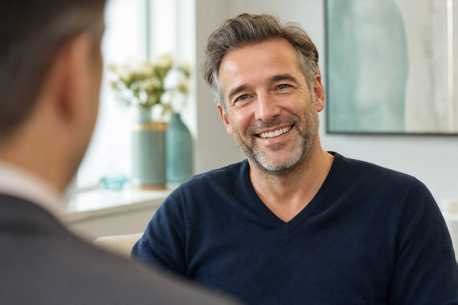 Patient smiling confidently after dental crown treatment