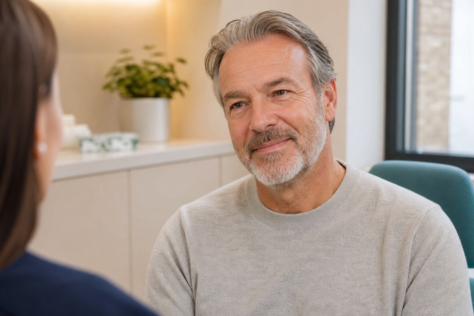 Patient feeling reassured after tooth extraction planning