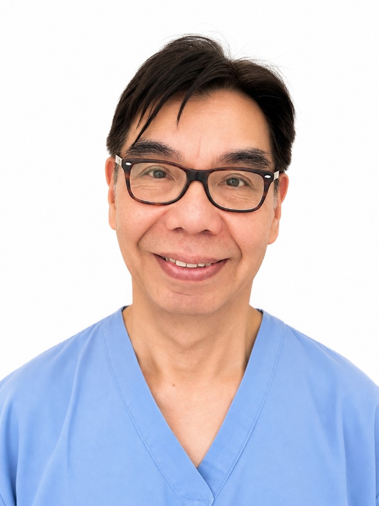 Dr Warren Law, dentist with special interest in endodontics and dentures at Bridge Dental